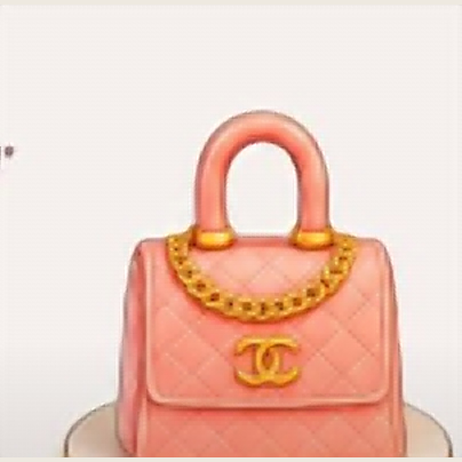 Light pink quilted designer handbag-shaped cake inspired by Chanel