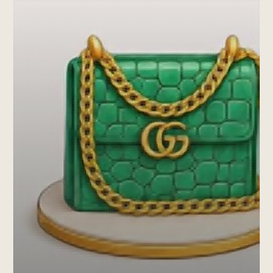 Dark green designer handbag-shaped cake inspired by Gucci
